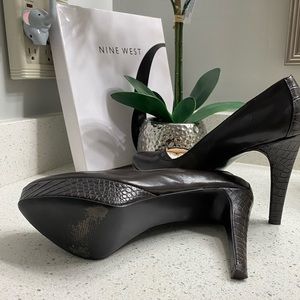 Chocolate heels 2 1/2 inches only worn once very beautiful stylish.